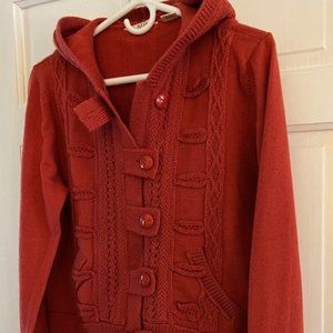 lia Molly very cool sweater. Love the detail-cable knit, tabs & buttons, hooded